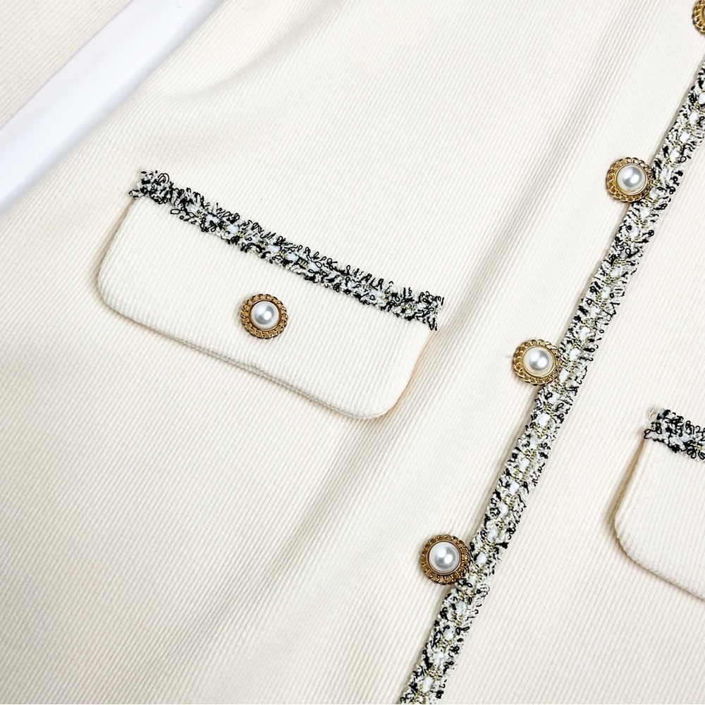 Elegant Cream Dress with Black Bow & pearl details - Picture 10 of 11